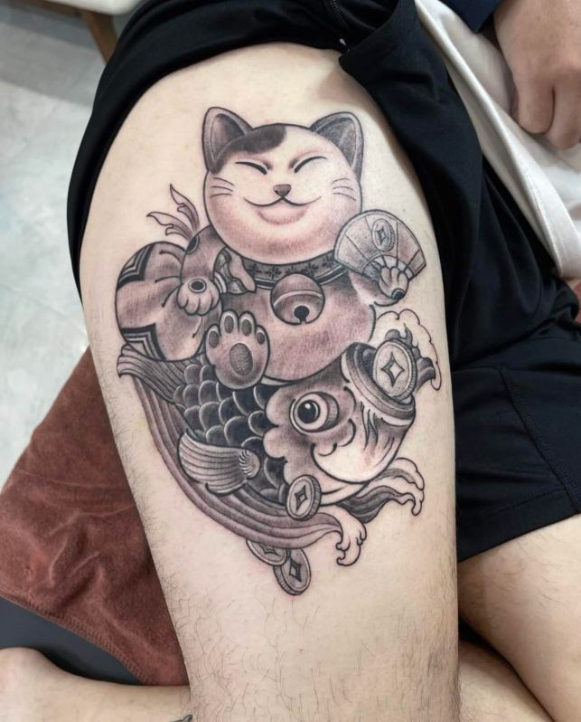 Hình xăm mèo thần tài và cá chép