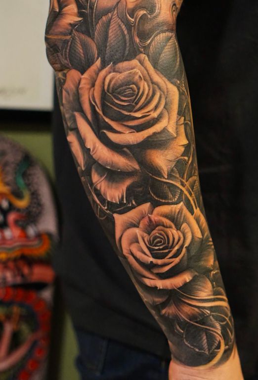 hình xăm hoa hồng cho nam là lựa chọn lý tưởng để khẳng định dấu ấn cá nhân đầy cuốn hút